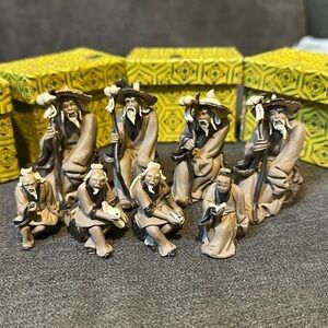 Very old Chinese Mud men.